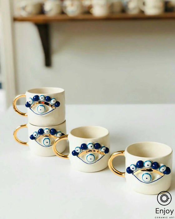 Evil Eye Coffee Mug - Artisanal, Handmade 10oz Ceramic Coffee Cup with Gold Handle, Evil Eye Protection Symbol