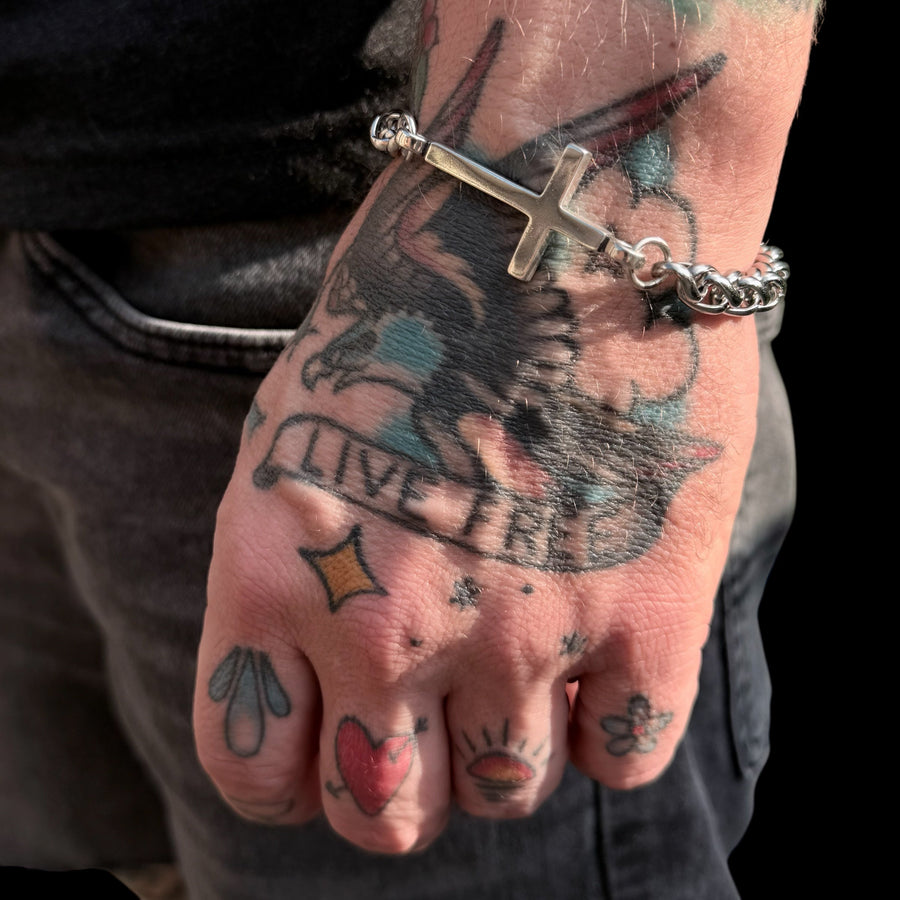 Classic Cross chain bracelet worn on a wrist