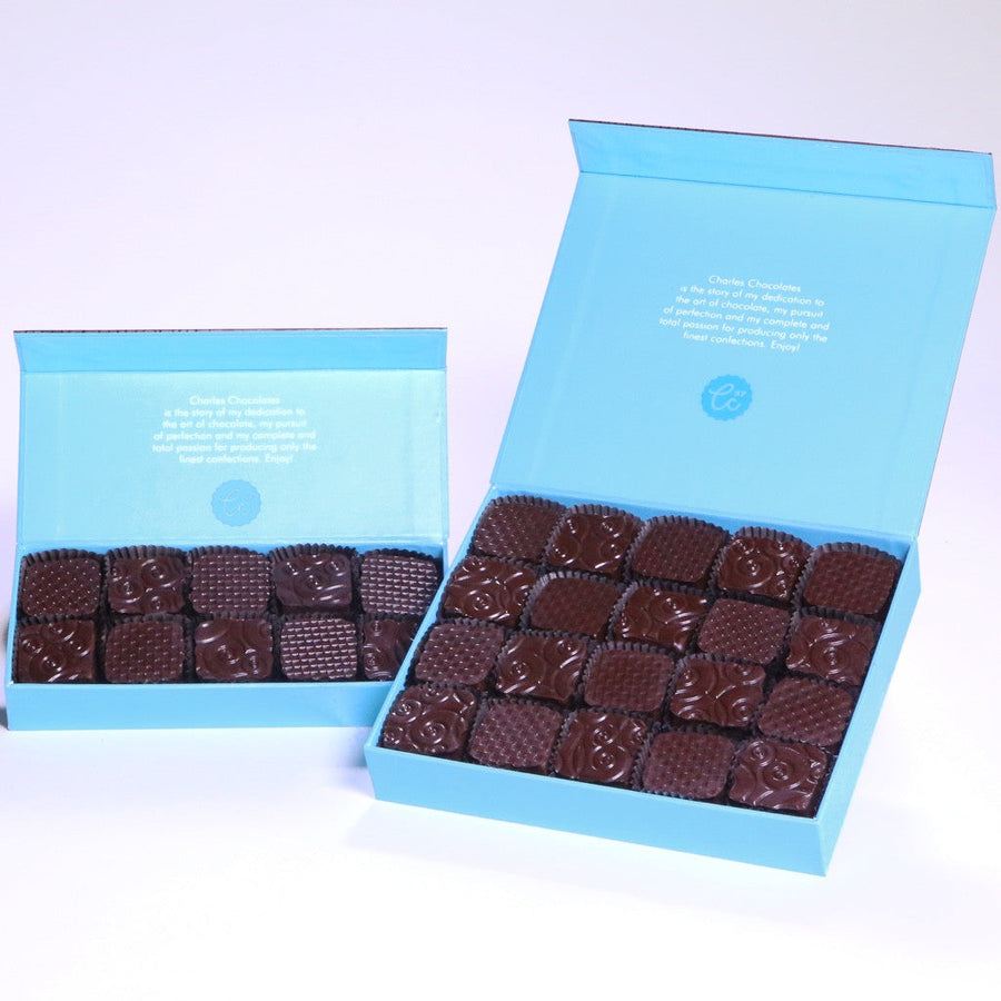 Two open boxes of Fleur de Sel Chocolate-Covered Caramels