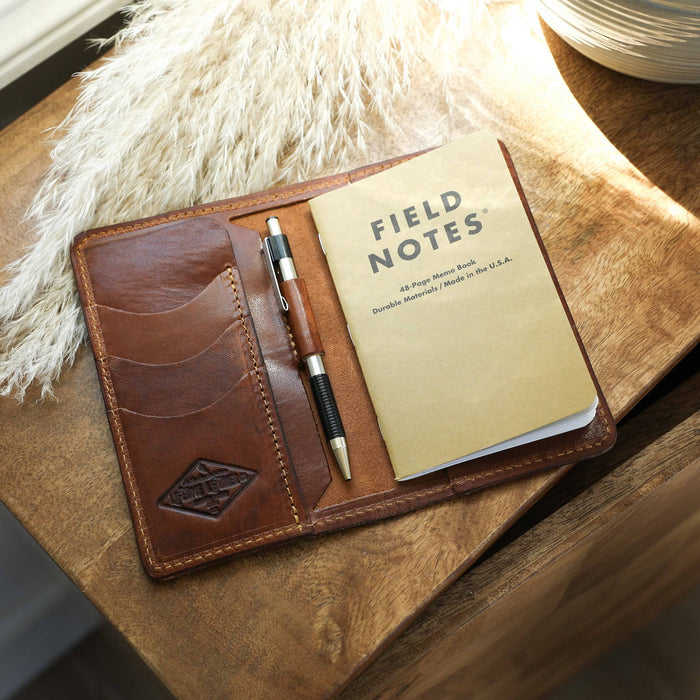 The Field Notes Wallet open on side table.