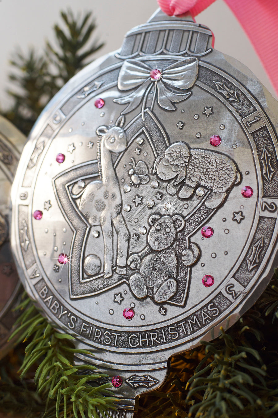 Styled display featuring Baby Girl’s First Christmas Ornament with Crystals