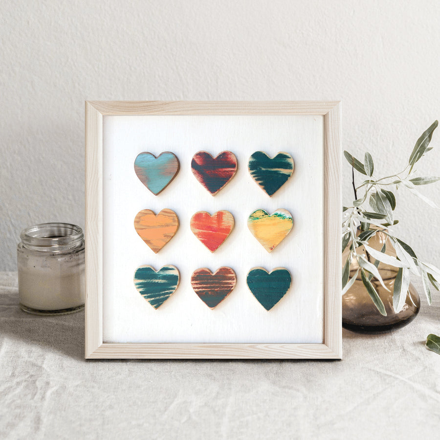 Heart Grid art print showing a three-by-three arrangement of colorful hearts.