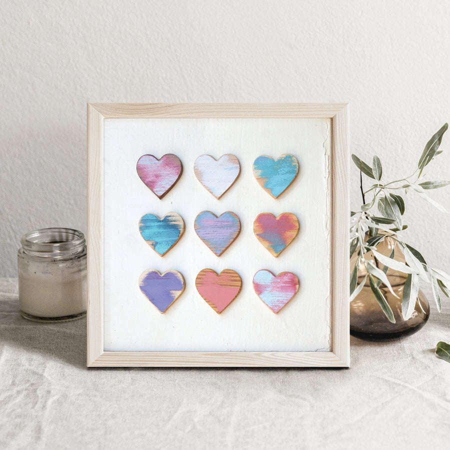 Heart Grid art print showing a three-by-three arrangement of colorful hearts.