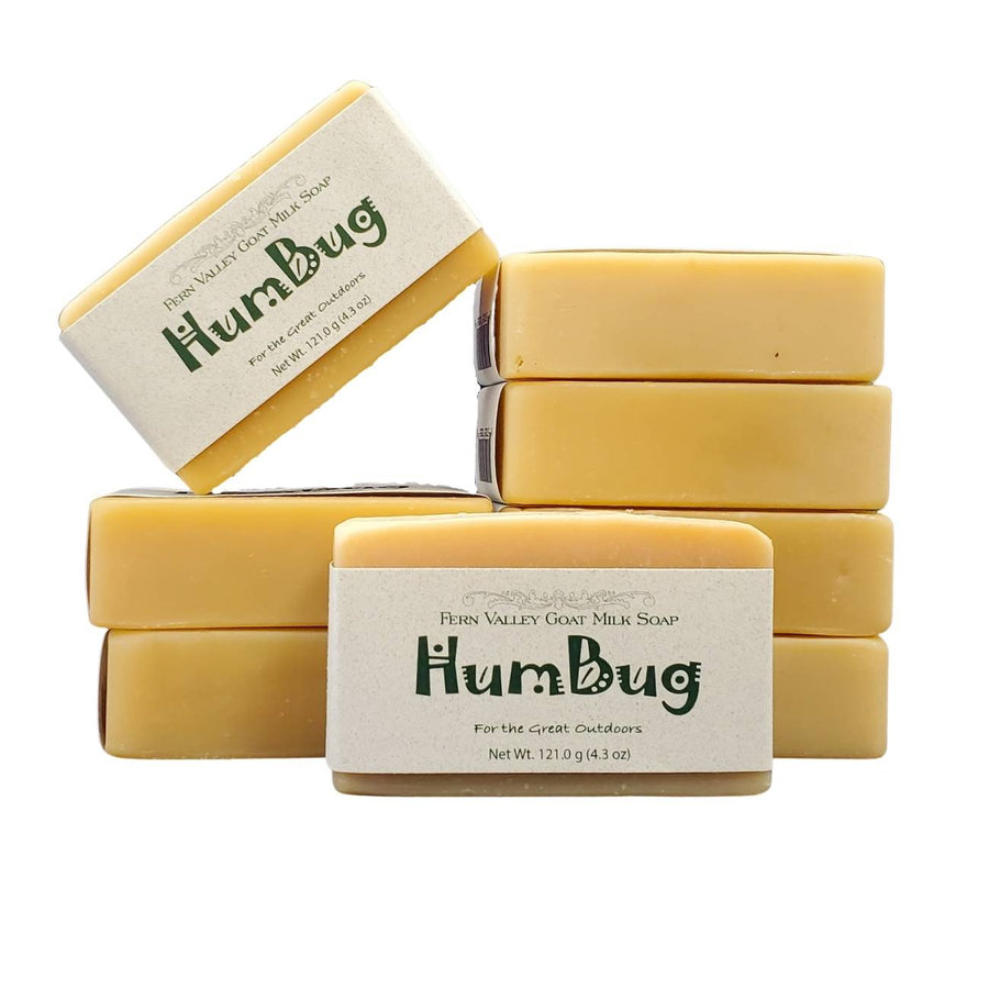Humbug Tea Tree & Peppermint goat milk soap — three labelled bars arranged at angles
