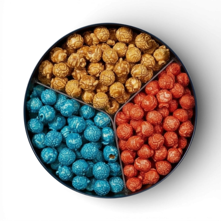 Open tin with caramel, Hot Cheddar, and blue Hot White Cheddar popcorn compartments
