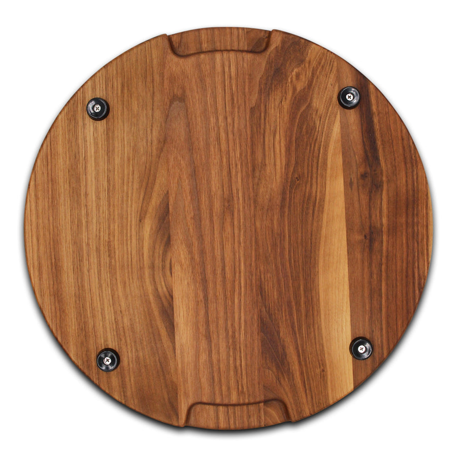 Walnut round board underside showing pocket handles and rubber feet