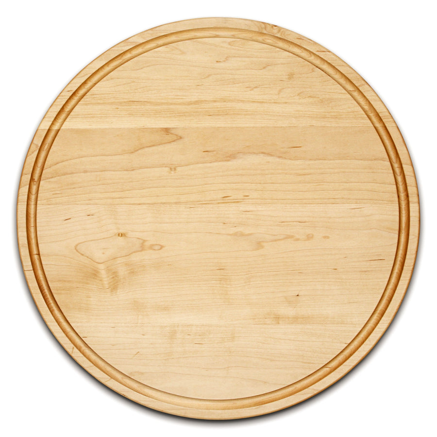 Overhead view of a round maple board with a circular groove