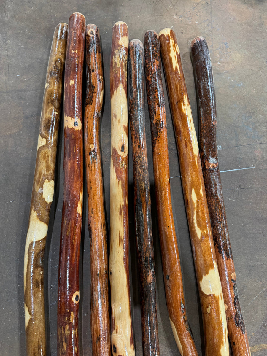 Close-up of varied wood grain and shapes on sealed hardwood hiking sticks