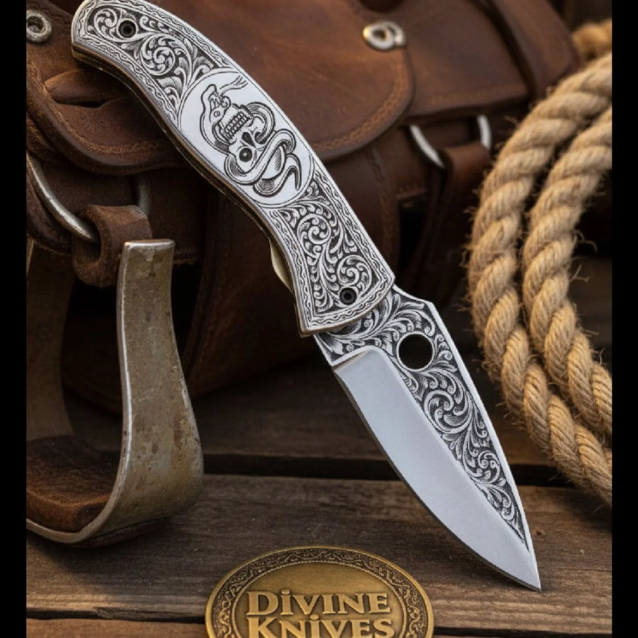 Engraved Scrollwork Folding Knife with Silver Finish and Detailed Blade Etching