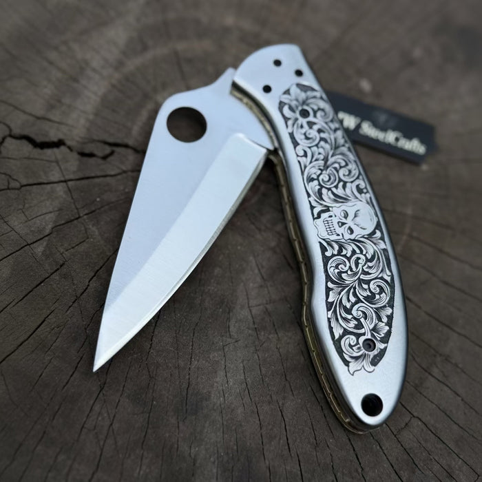 Hand Engraved D2 Steel Folding Pocket Knife — Mirror Polished Leaf Blade, Skull Floral Scroll Stainless Handle