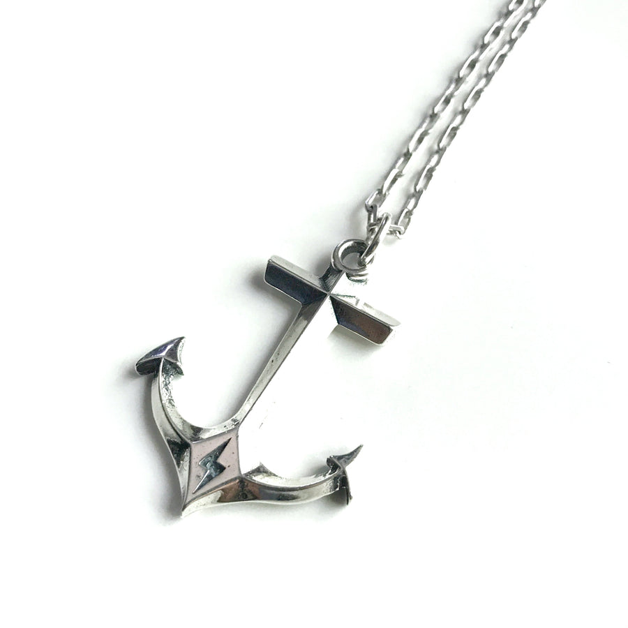 Anchor pendant and chain against white