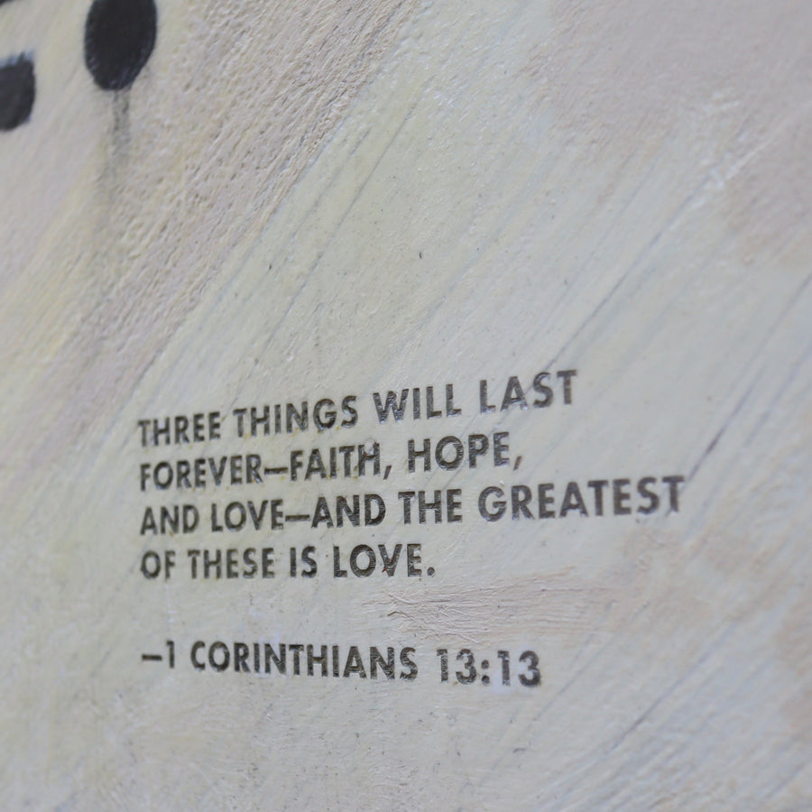 The Greatest of These Is Love art print with bold black lettering.