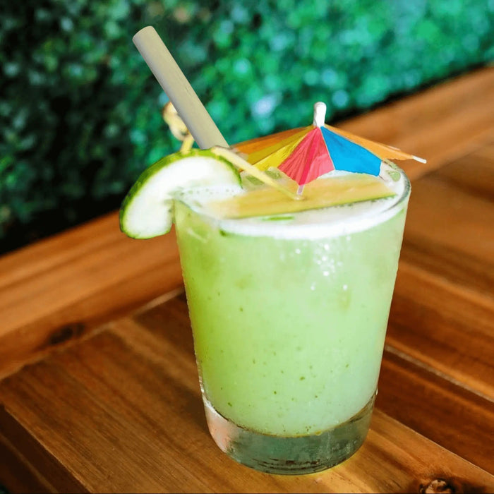 Iced melon drink with cocktail reed drinking straw