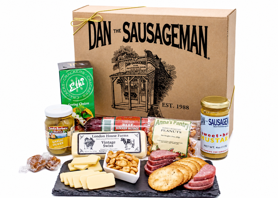 Juneau gift box with sausage, Swiss cheese, crackers, garlic-stuffed olives, cashews and Almond Roca; serving display