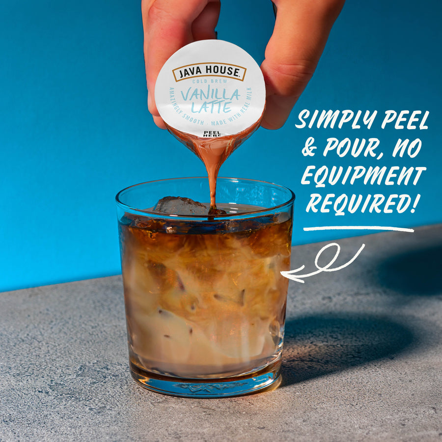 Vanilla latte concentrate being poured over ice