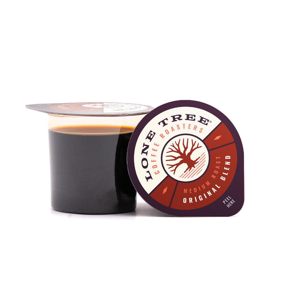 Open Original Blend coffee pod with lid