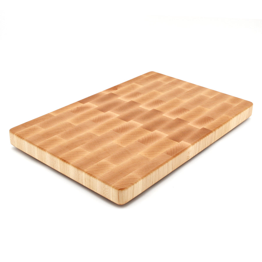Maple end-grain cutting board photographed at an angle