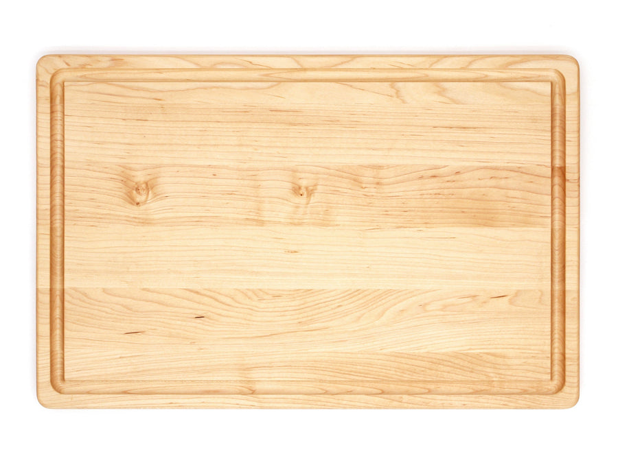 Maple cutting board with a rectangular perimeter juice groove