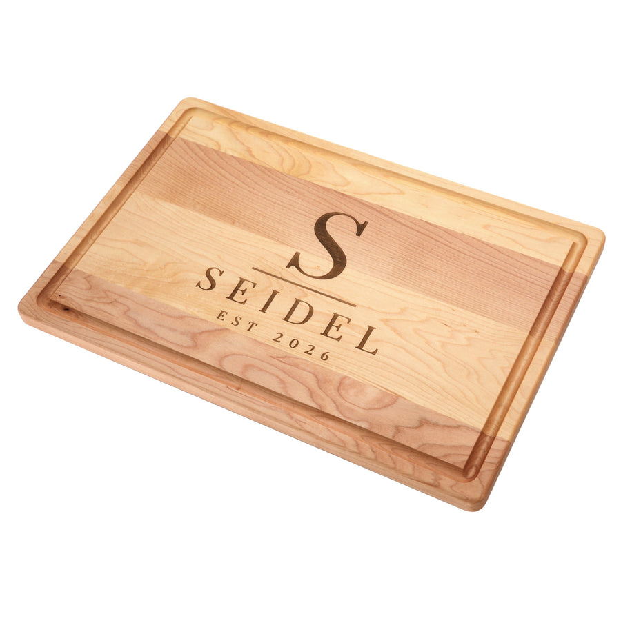 Maple board with an example monogram and family-name engraving