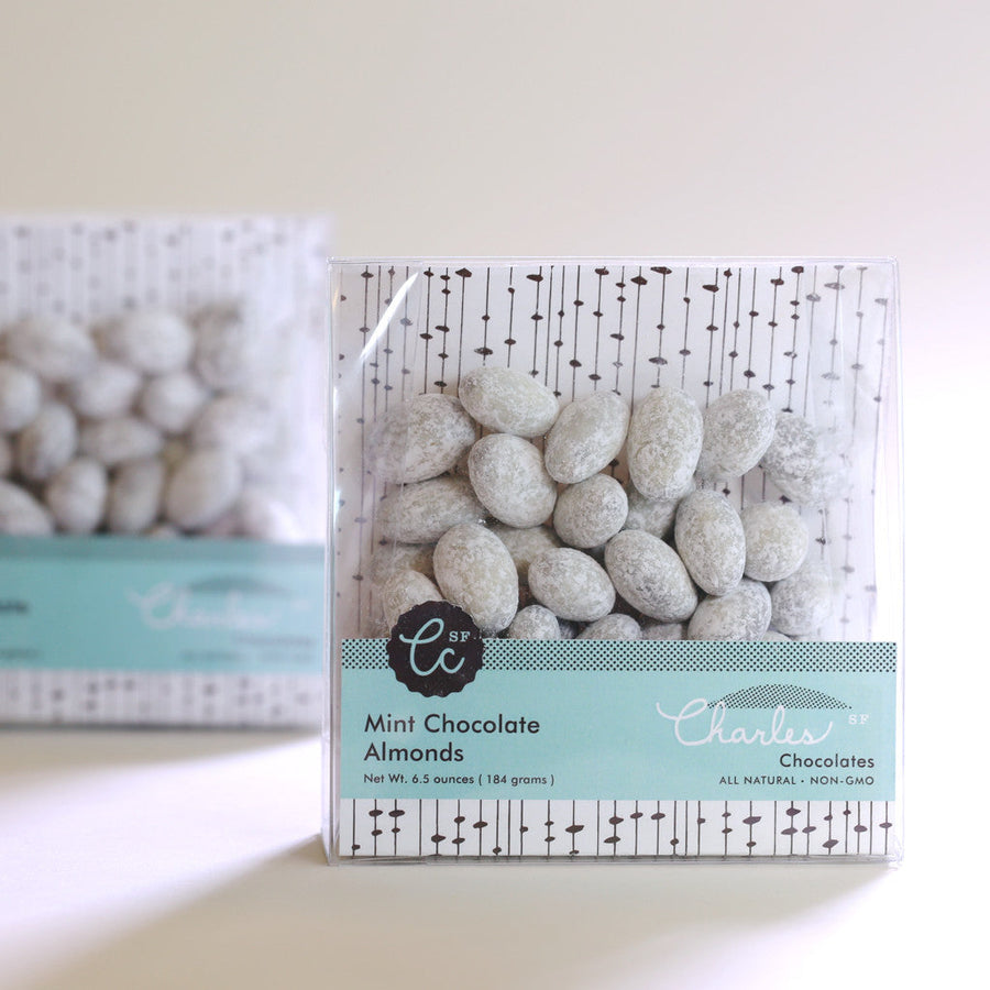 Two packages of powdered-sugar-finished Mint Chocolate Almonds