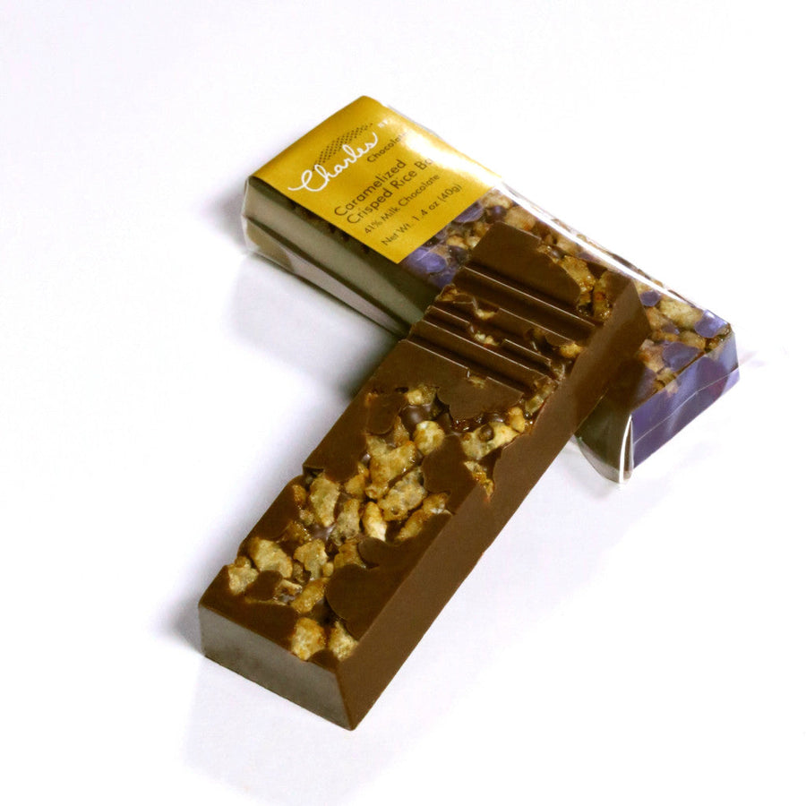 Mini Milk Chocolate Crisped Rice Bar displayed with opened packaging