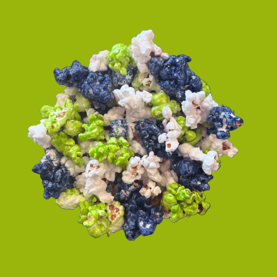 Bowl of navy & action green candy-coated and white salted popcorn