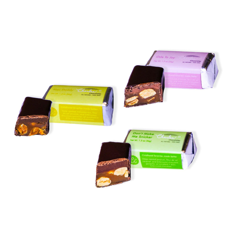Three Nostalgia chocolate bars displayed with their opened wrappers