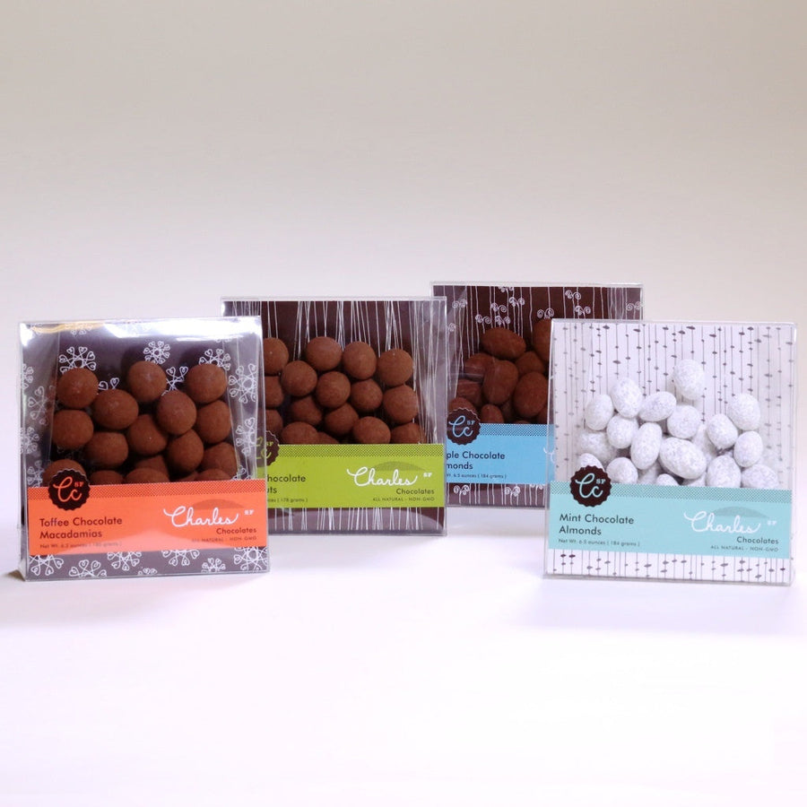 Chocolate-covered almond, hazelnut, mint almond, and macadamia packages