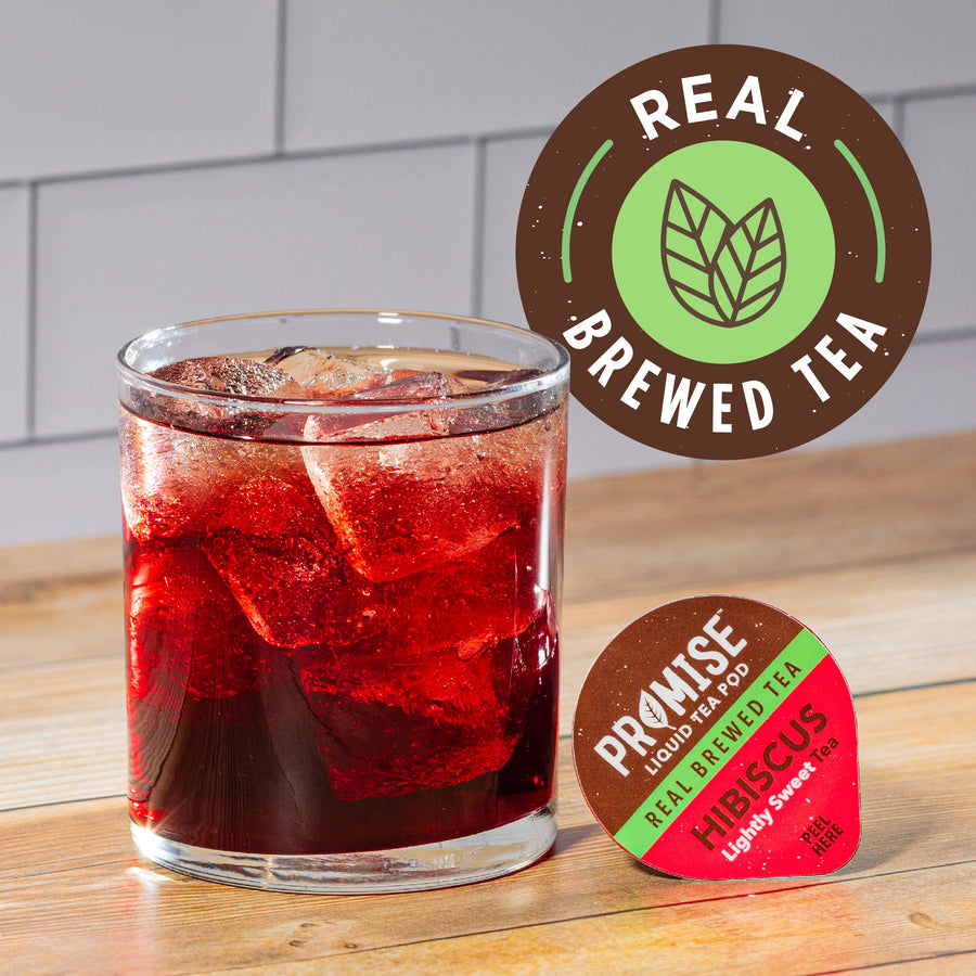 Prepared hibiscus iced tea beside a pod