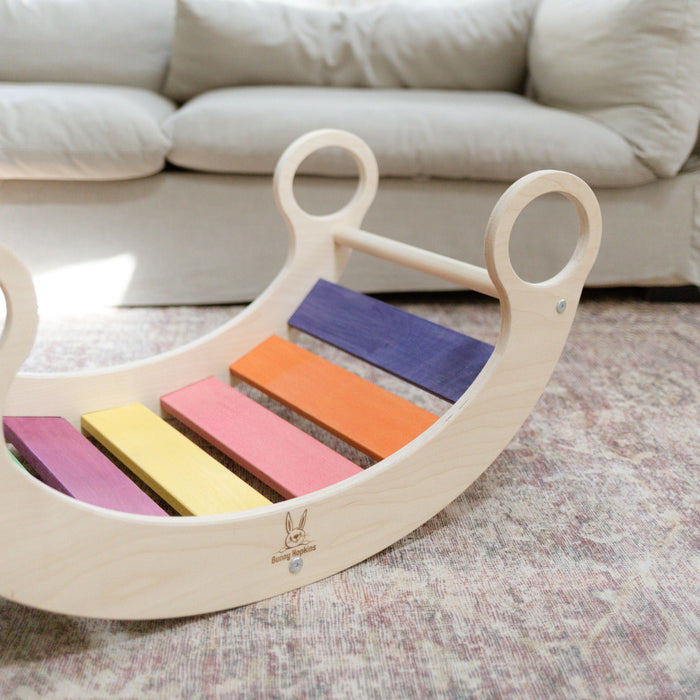 Kids exploring with a rocker climber arch