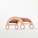 Kids using a rocker climber arch for fun