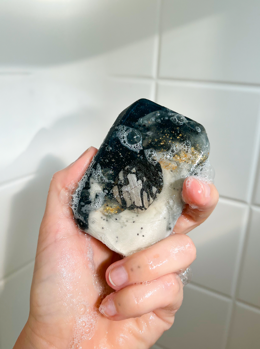 Zen Daydream silver leaf jasper soap held in a hand