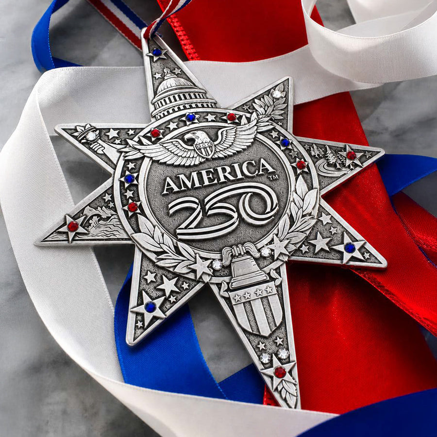 Styled display featuring America250 Sea to Shining Sea Ornament (Aluminum and Crystals)