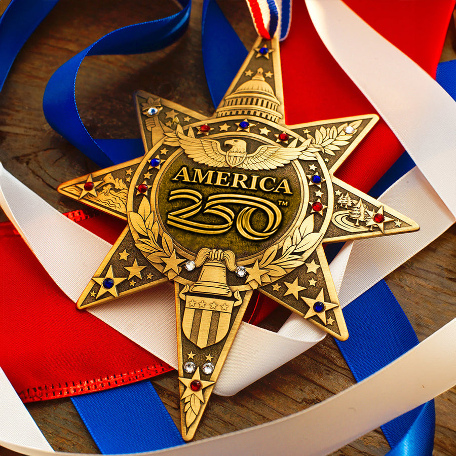 Styled display featuring America250 Sea to Shining Sea Ornament (Bronze and Crystals)