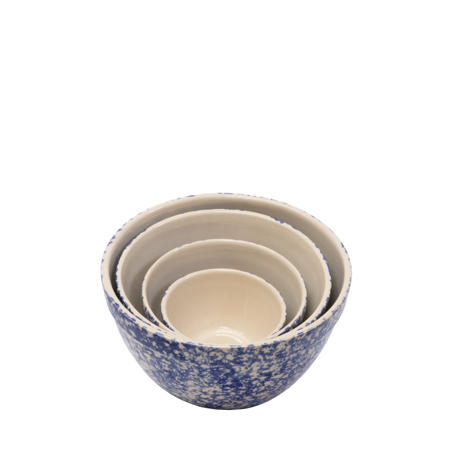Nested blue sponge-pattern stoneware shoulder bowls in several sizes