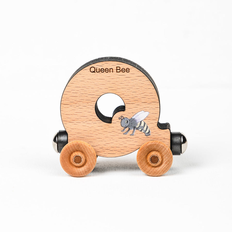 Wooden alphabet train letter Q car with an animal illustration and wheels