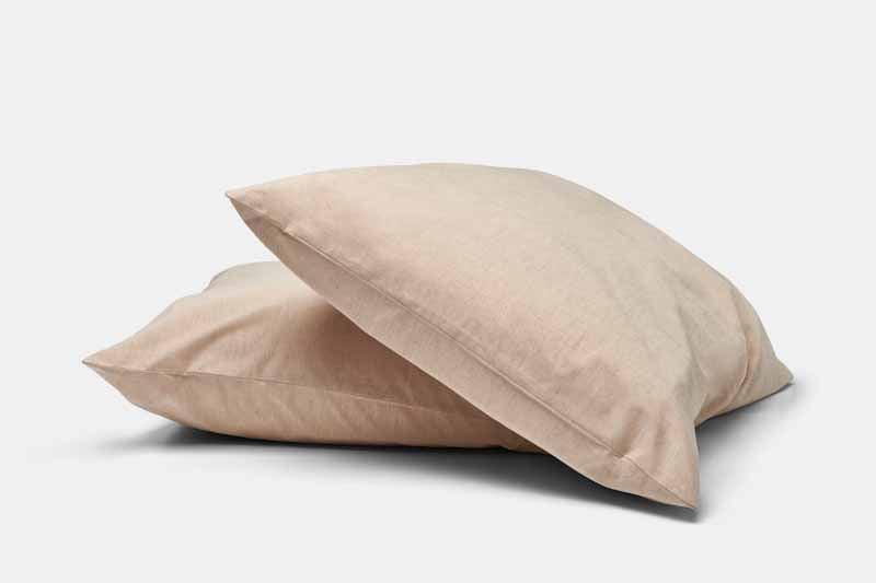 Two Latte Linen cotton pillowcases on pillows
