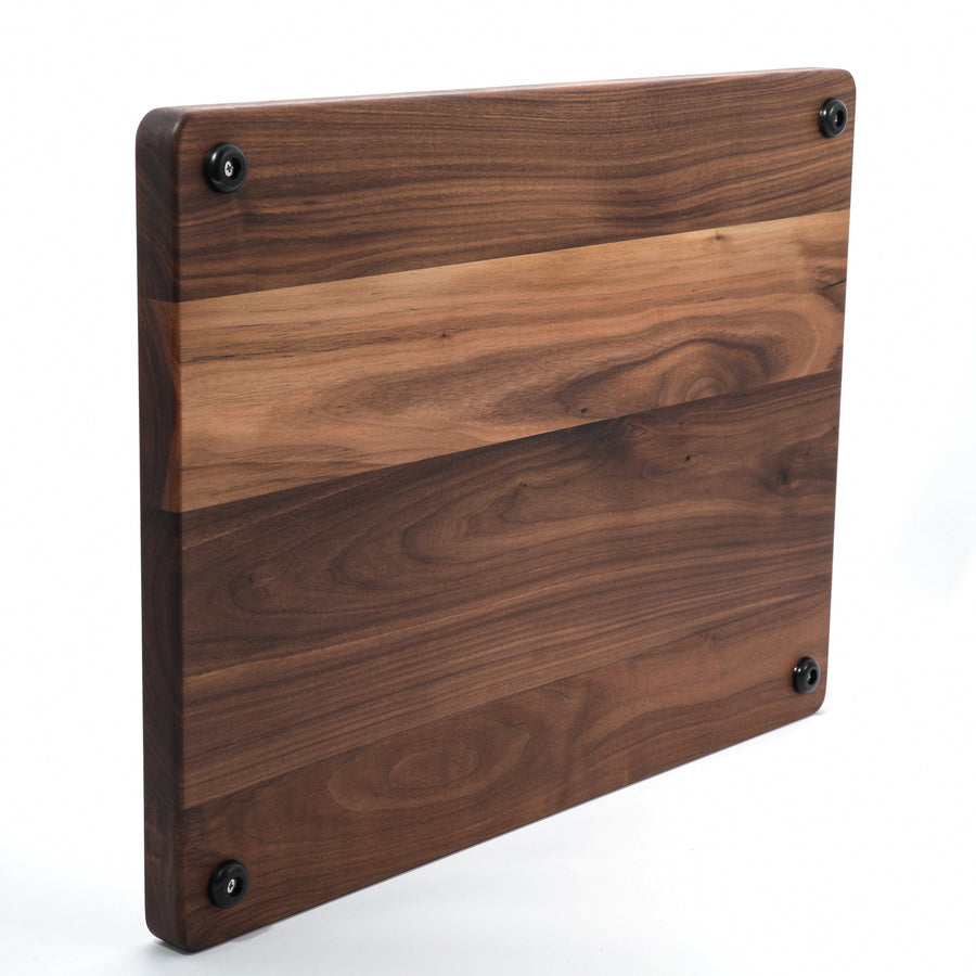 Walnut board underside with rubber feet and a pocket handle