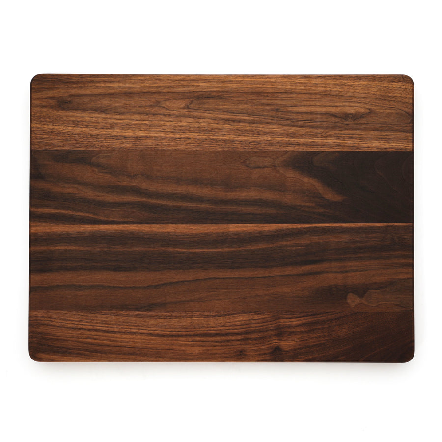 Plain rectangular walnut cutting board, overhead view