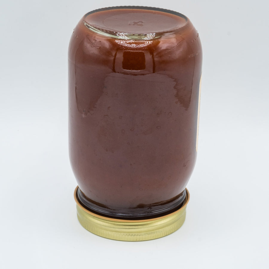 Bottom and reverse view of the Apple Butter BBQ Sauce jar.