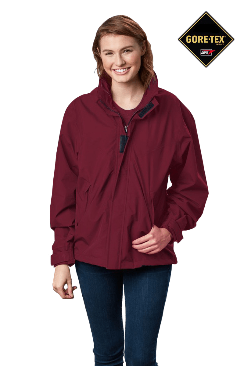 Blitz Waterproof Jacket: model wearing burgundy shell.