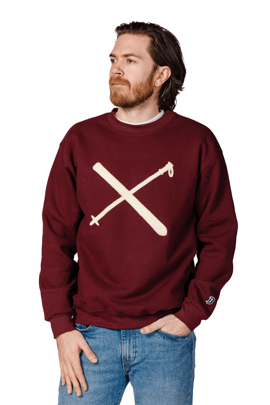 Crossed Skis Felt Crewneck Sweatshirt: model wearing burgundy crossed-skis sweatshirt.