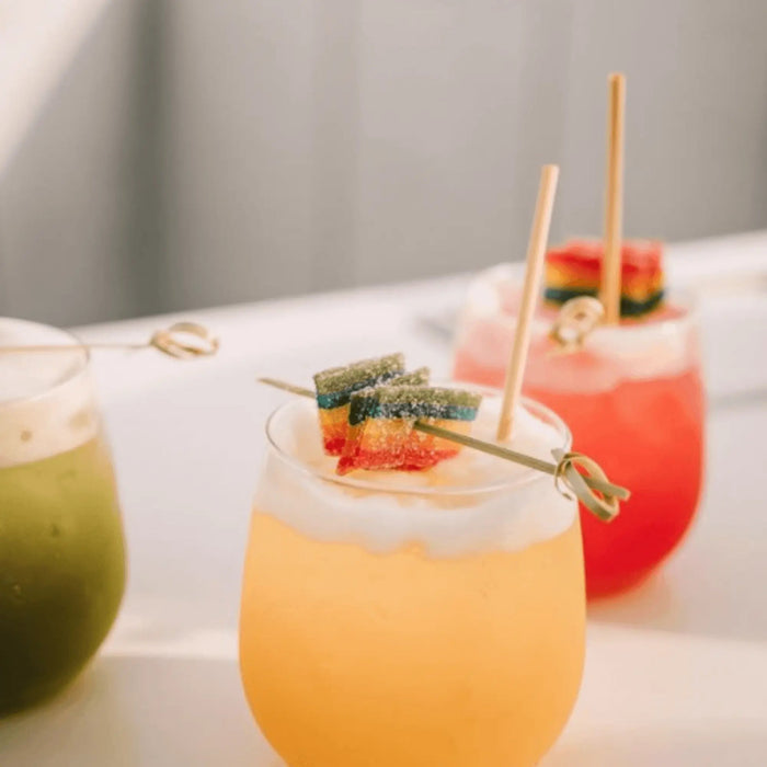 candy infused cocktail with cocktail wheat straw