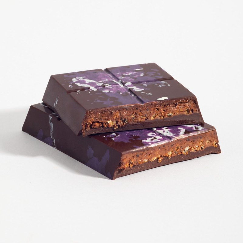 Peanut Praline Crunch bar cut open to show the filling