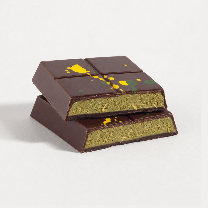 Cut Original Pistachio Dubai bar showing the pistachio and kataifi center