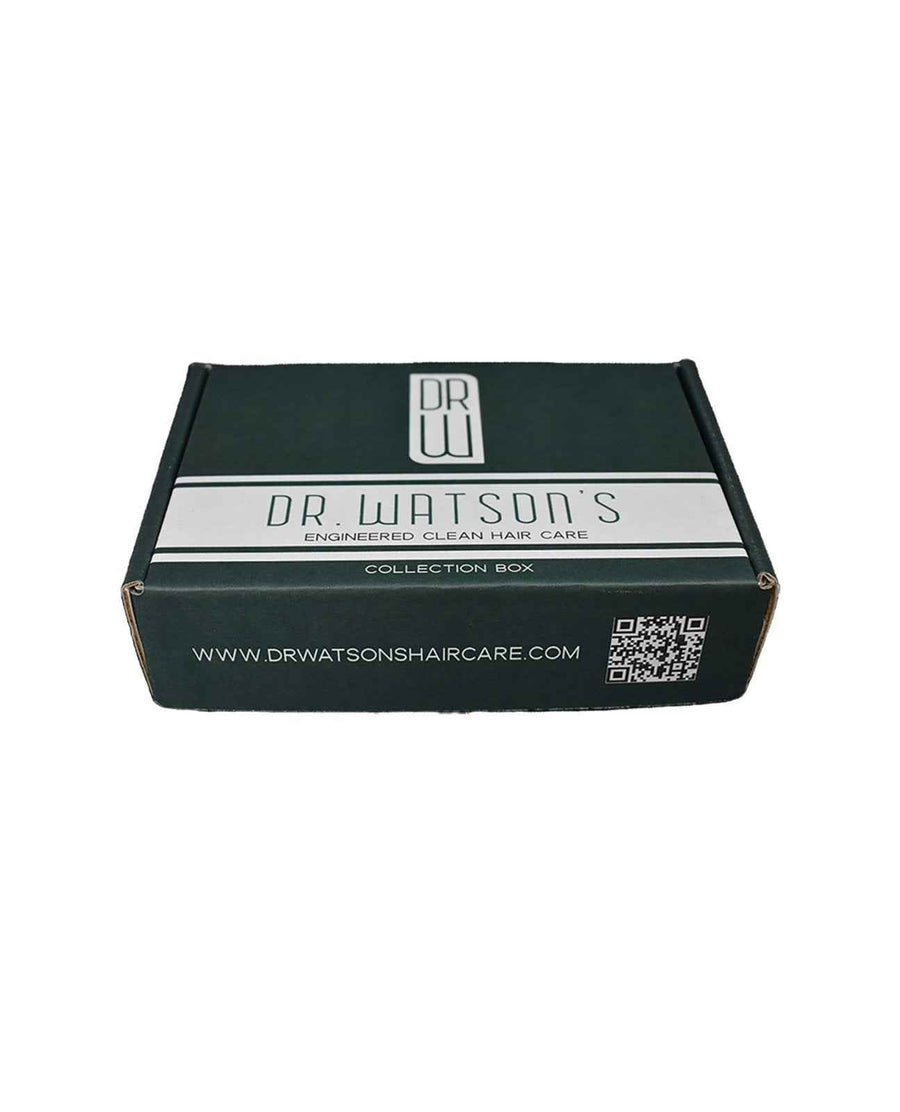 Closed Dr. Watson's hair care Discovery Set box on white