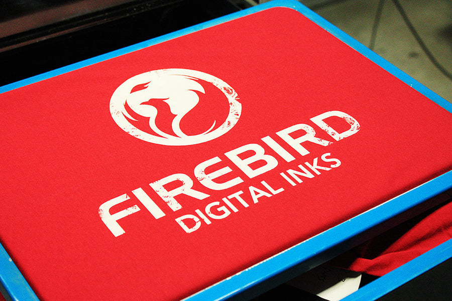 White FIREBIRD logo printed on red fabric