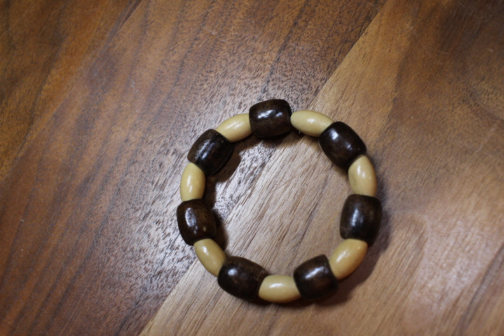Brown Barrel and Tan Oval Wood Bead Bracelet by Theiss