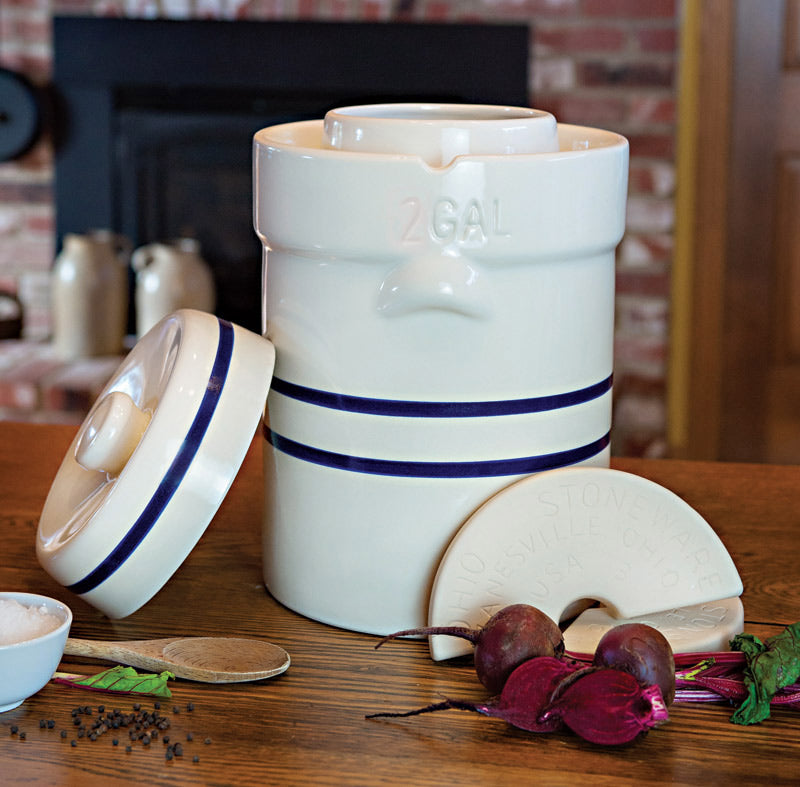 Three-gallon water-seal crock kit shown as a style example, with lid and semicircular weights