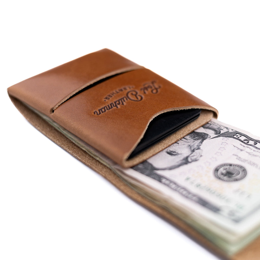 Brown Franklin 2 leather wallet, angled detail of the cash opening